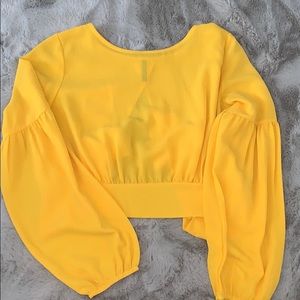 Beautiful open tie back blouse